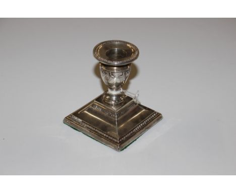 A silver Adam design dwarf candlestick 