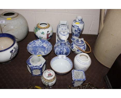 A collection of various Oriental china to include a moon flask, restored