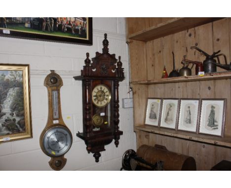 A mahogany cased two hole wall clock 