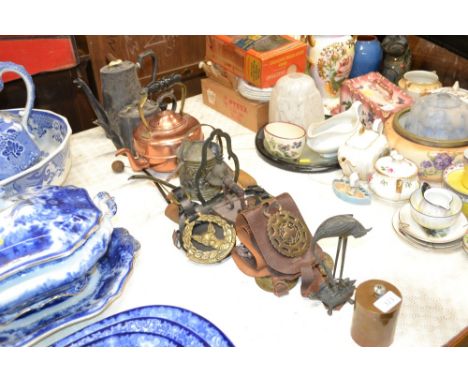 A quantity of various metal ware to include a brass embossed miniature watering can; various horse brasses; an Oriental model