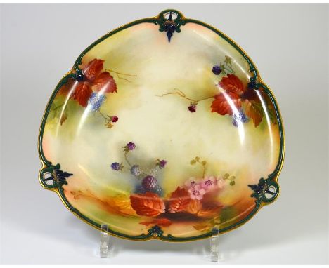 A Royal Worcester Hadley dish, with fruit decoration and pierced gilding to rim, signed K. Blake. Printed marks including ret