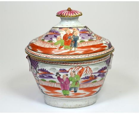 An English, possibly New Hall, sucrier, polychrome decorated with chinoiserie scenes. Circa 1810. Height 15cm.
