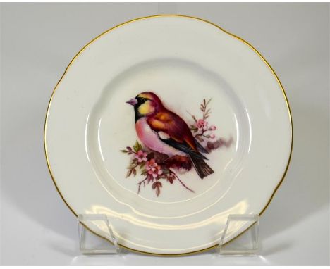 A Royal Worcester plate, with hawfinch decoration attributed to W. Powell and date code for 1908. Printed marks. Diameter 12.