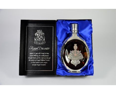 A Haig's Dimple Royal decanter Deluxe Scotch Whisky, one bottle in presentation box.
