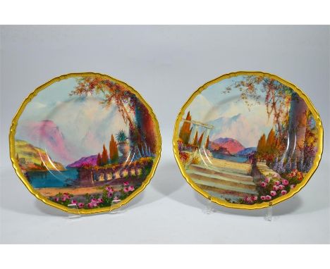 A pair of Royal Worcester plates, Italian lakes scenes, signed H. George and date code for 1930. Diameter 27cm. (2)