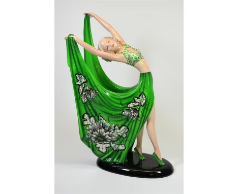 A large Goldscheider glazed figure of a posed dancer designed by Stephan Dakon. Model 7195. Impressed and printed marks. Heig