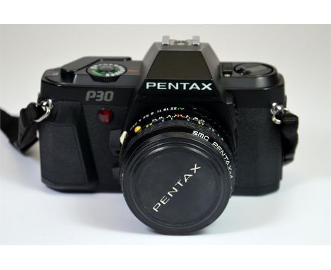 A Pentax P30 camera in a leather case.