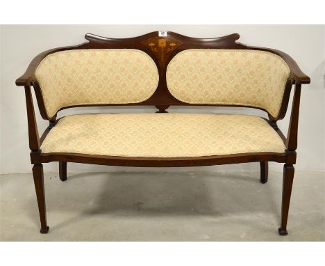 An Edwardian art nouveau inlaid mahogany two seat sofa. Circa 1910. Height 81cm.