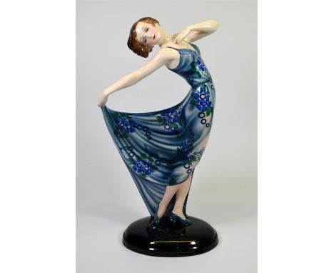 A large Goldscheider glazed figure of a posed dancer designed by Josef Lorenzl. Model 6492. Impressed and printed marks. Remn