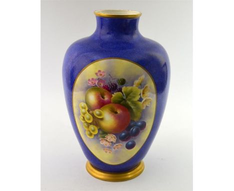 A Clermont Fine China porcelain vase, with two panels of fruit decoration on a blue ground by former Royal Worcester artist J