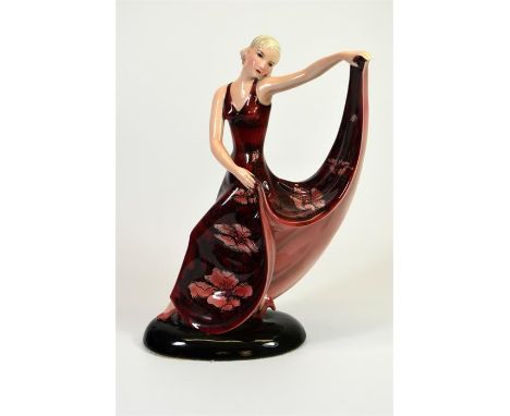 A Goldscheider glazed figure of a posed dancer designed by Stefan Dakon. Model 8234. Impressed and printed marks. Circa 1937.
