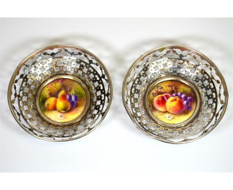 A pair of Royal Worcester silver mounted bon bon dishes, with fruit decoration. Signed by Ricketts. Date code for 1911 and 19