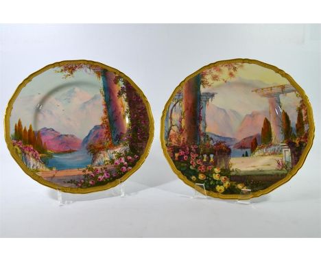 A pair of Royal Worcester plates, Italian lakes scenes, signed H. George and date code for 1930. Diameter 27cm. (2)