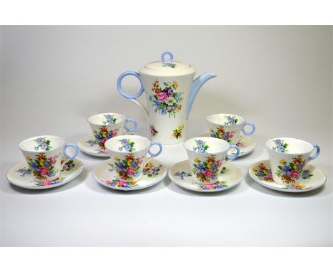 A Shelley floral spray Oxford shape part coffee service, comprising six cups, six saucers and a coffee pot. Circa 1920. (13)