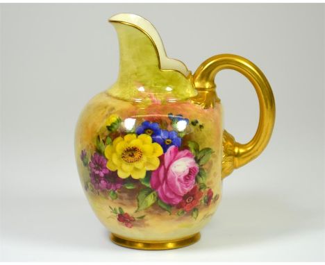 A Royal Worcester flatback jug with handle, with floral decoration and gilded rim, signed Freeman. Printed marks. Shape numbe