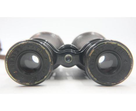 British WWI military issue field binoculars, supplied by Lemaire of Paris, with leather case, both marked with broad arrow. U