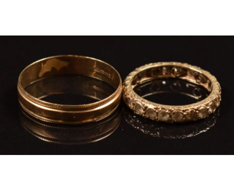 A 9ct gold wedding band / ring and a 9ct gold eternity ring set with spinel, 4.9g, size P &amp; Z