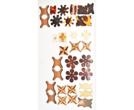 Sewing, needlework and embroidery interest thread winders including a mother of pearl example, set of four tortoiseshell, set