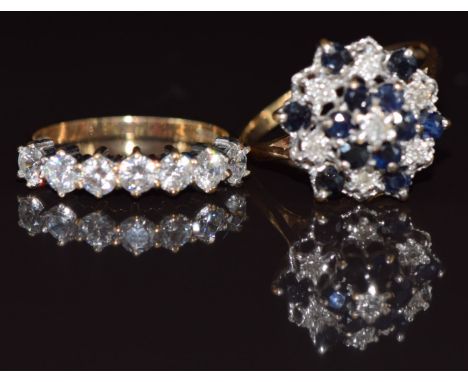 A 9ct gold ring set with sapphires and diamonds in a cluster and a 9ct gold ring set with cubic zirconia, 5.7g, size R &amp; 