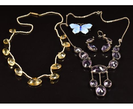 A c1900 seed pearl necklace with rose cut citrine drops, a silver and amethyst necklace, and a silver butterfly brooch set wi