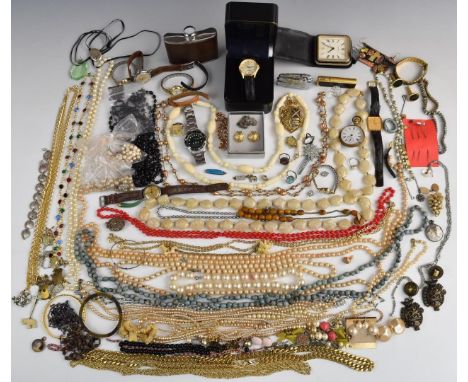 A collection of costume jewellery and watches including Certina watch, beads, gold tooth, brooches, Christian Dior earrings, 