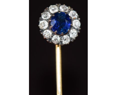 Victorian stick pin set with a round cut sapphire of approximately 0.6ct surrounded by old cut diamonds, in antique box, 2.6g