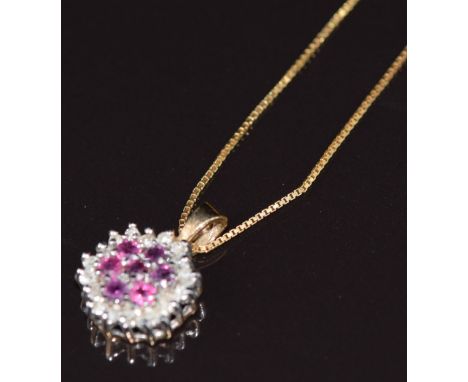 A 9ct gold pendant set with rubies and diamonds, on 9ct gold chain, 2g&nbsp;