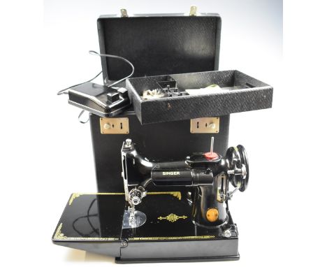 Singer 221K1 featherweight sewing machine, in original carry case with instructions, accessories, foot control and service re