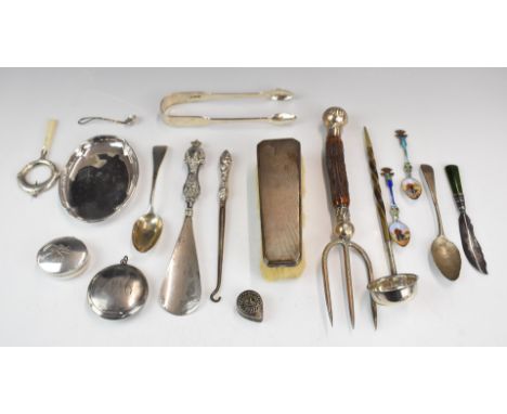 Hallmarked silver items to include fiddle pattern sugar nips, two teaspoons, pin tray, Egypt enamel souvenir spoons, baby's r