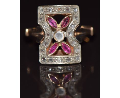 A 9ct gold ring set with marquise cut rubies and diamonds, 4.5g, size R