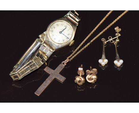 Two pairs of 9ct gold earrings (2.1g), a 9ct gold cross and chain (4.8g 50cm) and a 9ct gold case watch (13.5)