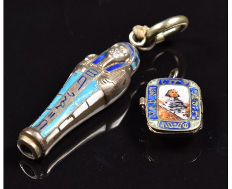 Egyptian Revival silver (800 grade) charm in the form of a Moses basket set with enamel with a baby inside and an Egyptian Re