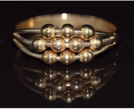 A 9ct gold abacus design ring with movable spheres, 1.7g, size P/Q