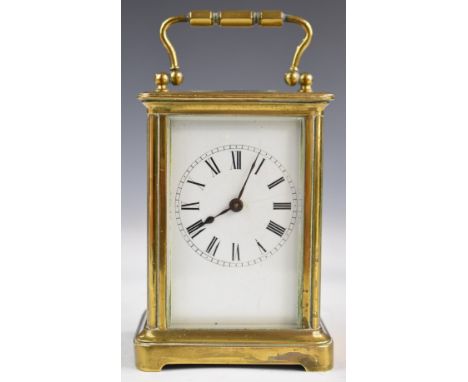 19th or early 20thC brass cased carriage clock, the white enamel dial having Roman numerals, height including handle&nbsp;14.