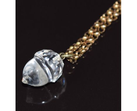 A c1900 9ct gold guard chain with engine turned barrel clasp and a glass pendant in the form of an acorn&nbsp;