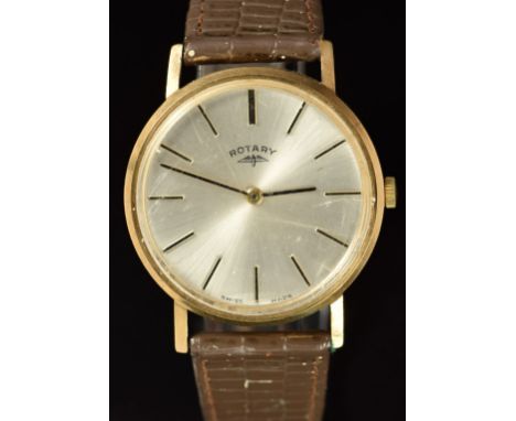 Rotary 9ct gold gentleman's wristwatch with black hands and hour markers, silver dial and mechanical movement, on brown leath