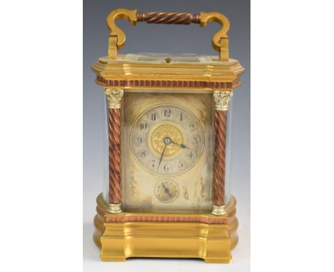 Richard &amp; Cie gilt, silvered and copper plated repeating carriage clock, with bevelled and curved glass panels, the silve