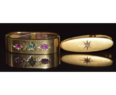 Victorian 9ct gold scarf clip set with an emerald and two rubies (3.4g 2.6x1cm) and a 10k gold clip set with a diamond, 1.5g 