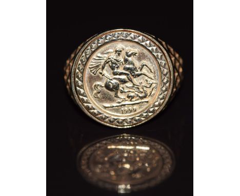 A 9ct gold ring set with faux 9ct gold coin, 2.2g, size R