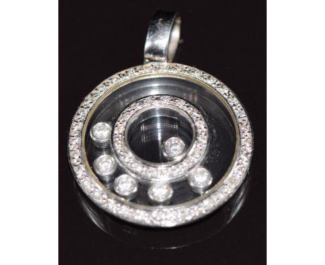 An 18ct white gold pendant set with diamonds with locket compartment containing further diamonds, Chopard style design, 7.9g&
