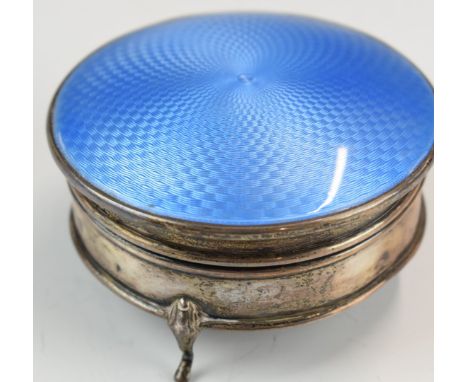 Art Deco hallmarked silver and blue guilloché enamel dressing table pot with hinged lid, raised on three feet, Birmingham 192