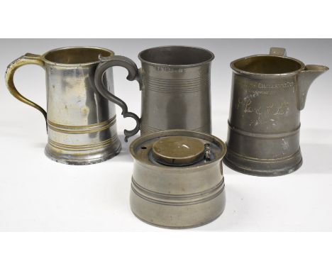Three large tankards, two marked Quart and one with brewery name to base, together with a Victorian large pewter inkwell with