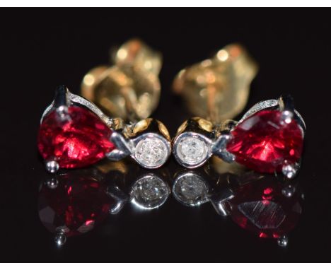 A pair of 9ct gold earrings set with a ruby and diamond, 1g&nbsp;