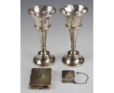 Pair of hallmarked silver trumpet vases or candlesticks (when upturned), height 13cm, hallmarked silver pill pot on chain and