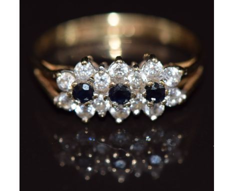 A 9ct gold ring set with sapphires and cubic zirconia, 1.5g, size J