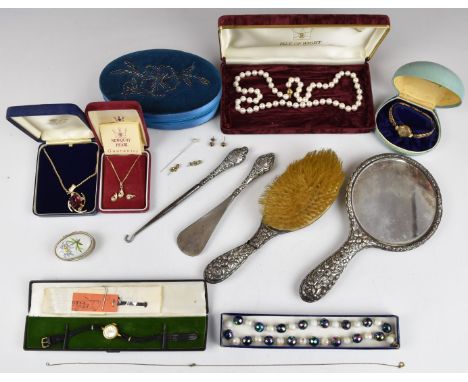 A collection of jewellery including 9ct gold watch, faux pearl necklace with 9ct gold clasp, silver dressing table items, etc