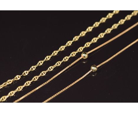 A 9ct gold necklace made up of mariners links (2.2g) and an 18ct gold necklace/ chain with sphere decoration (4.4g), 39cm