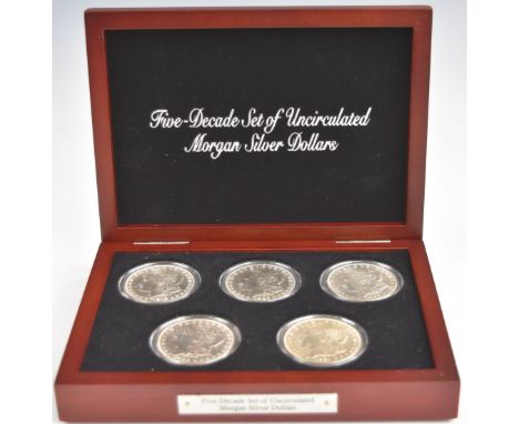 Five Decade Set of Uncirculated Morgan USA Silver Dollars, in deluxe fitted case