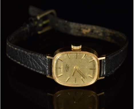 Rotary 9ct gold ladies wristwatch with two-tone hands and baton hour markers, gold dial and mechanical movement, on black lea