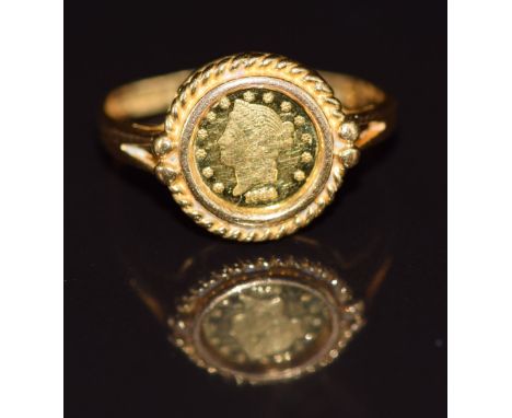 A 22ct gold ring set with miniature gold coin, 2.8g, size K